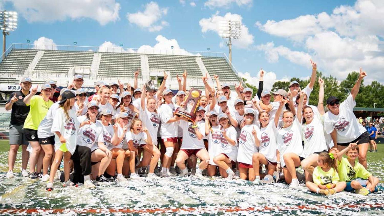 Photograph of the BC women's lacrosse players and coaching staff